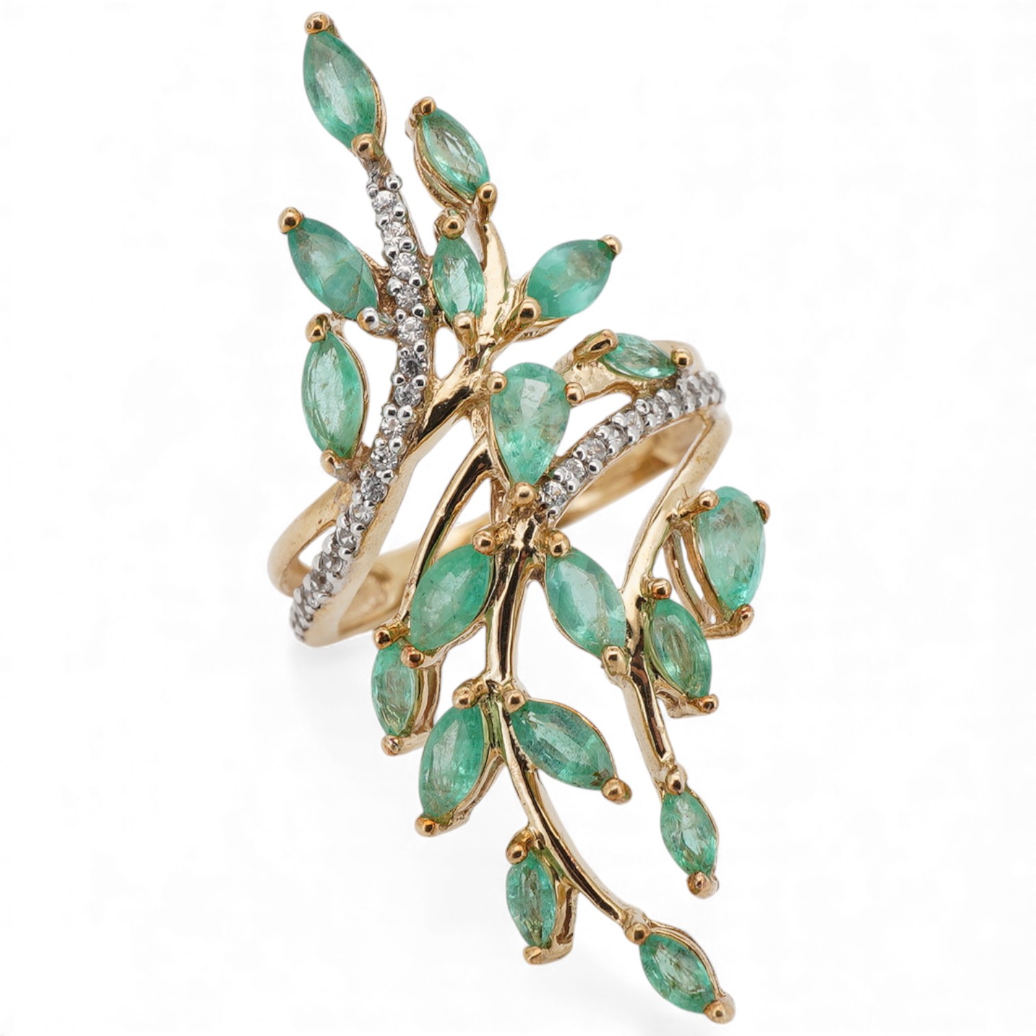 A recent 9ct gold, emerald and diamond set cluster up finger ring, of ornate foliate design, size M/N, gross weight 4.8 grams.